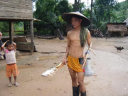 A Nam Ou fisher returning from retrieving his catch early in the morning using a fixed gillnet. Photo taken in May 2010. Similar gears are in use around the Nam Ton / Mekong confluence point